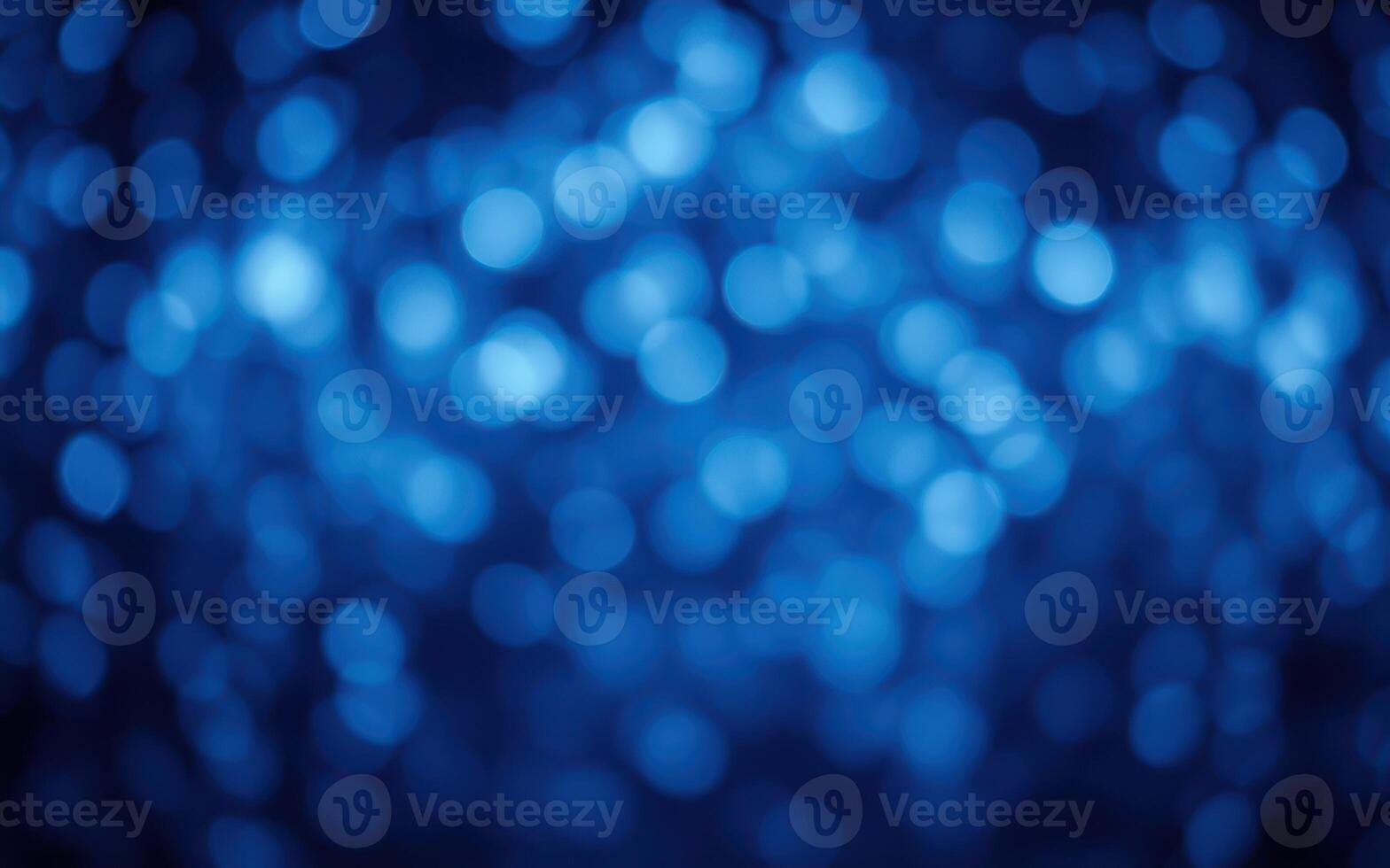 Colorful blue bokeh background with soft glowing orbs and abstract design photo