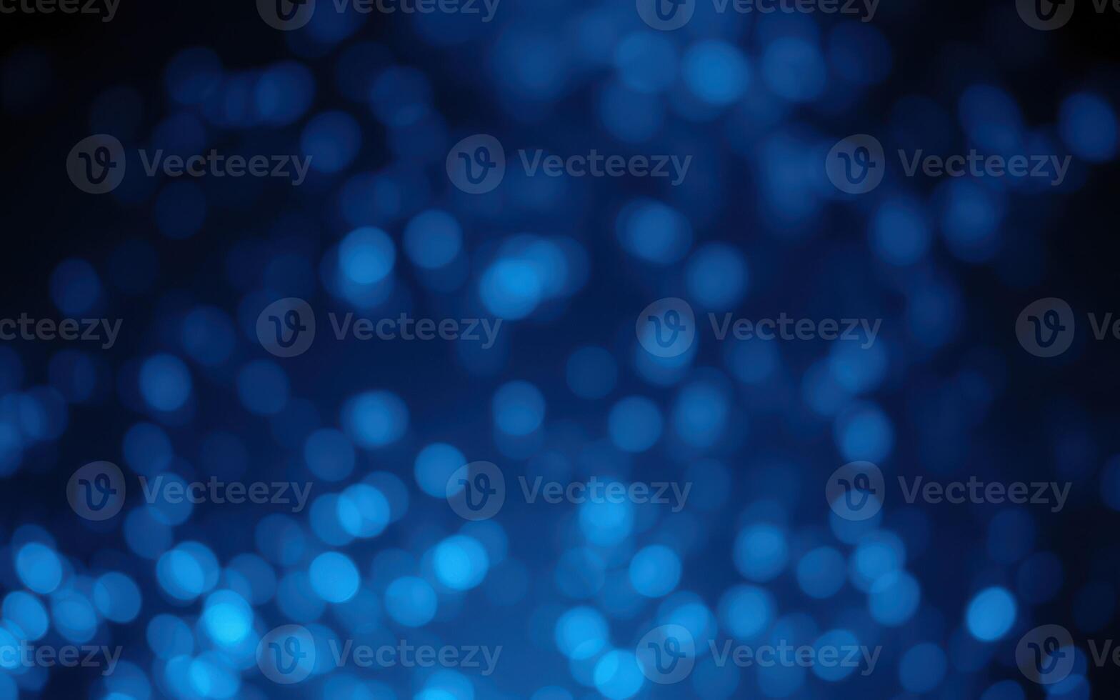 Vibrant blue bokeh lights create a dreamy atmosphere in a nighttime setting photo