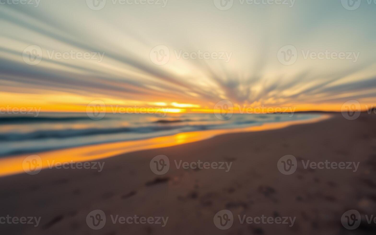 Vibrant sunset over a tranquil beach with waves gently crashing at dusk photo