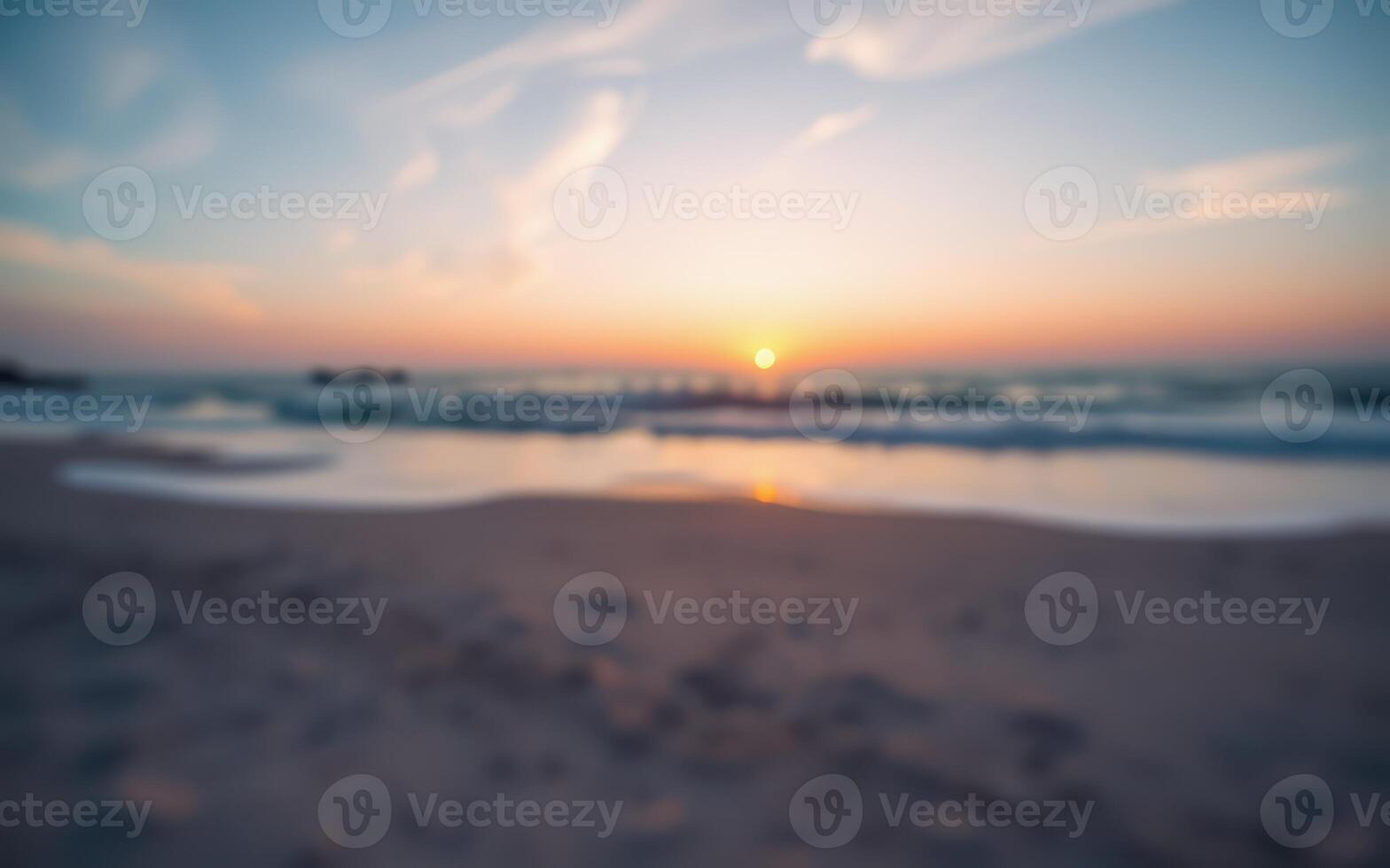 Beautiful sunset at the beach with gentle waves lapping the shore on a serene evening photo