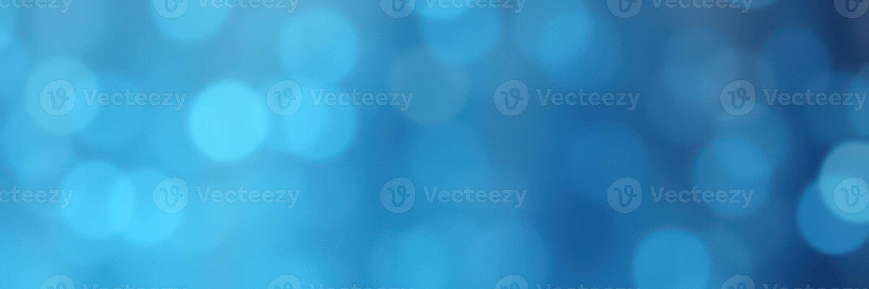 Vibrant abstract background featuring soft blue bokeh effects creating a serene and calming atmosphere during a summer evening photo