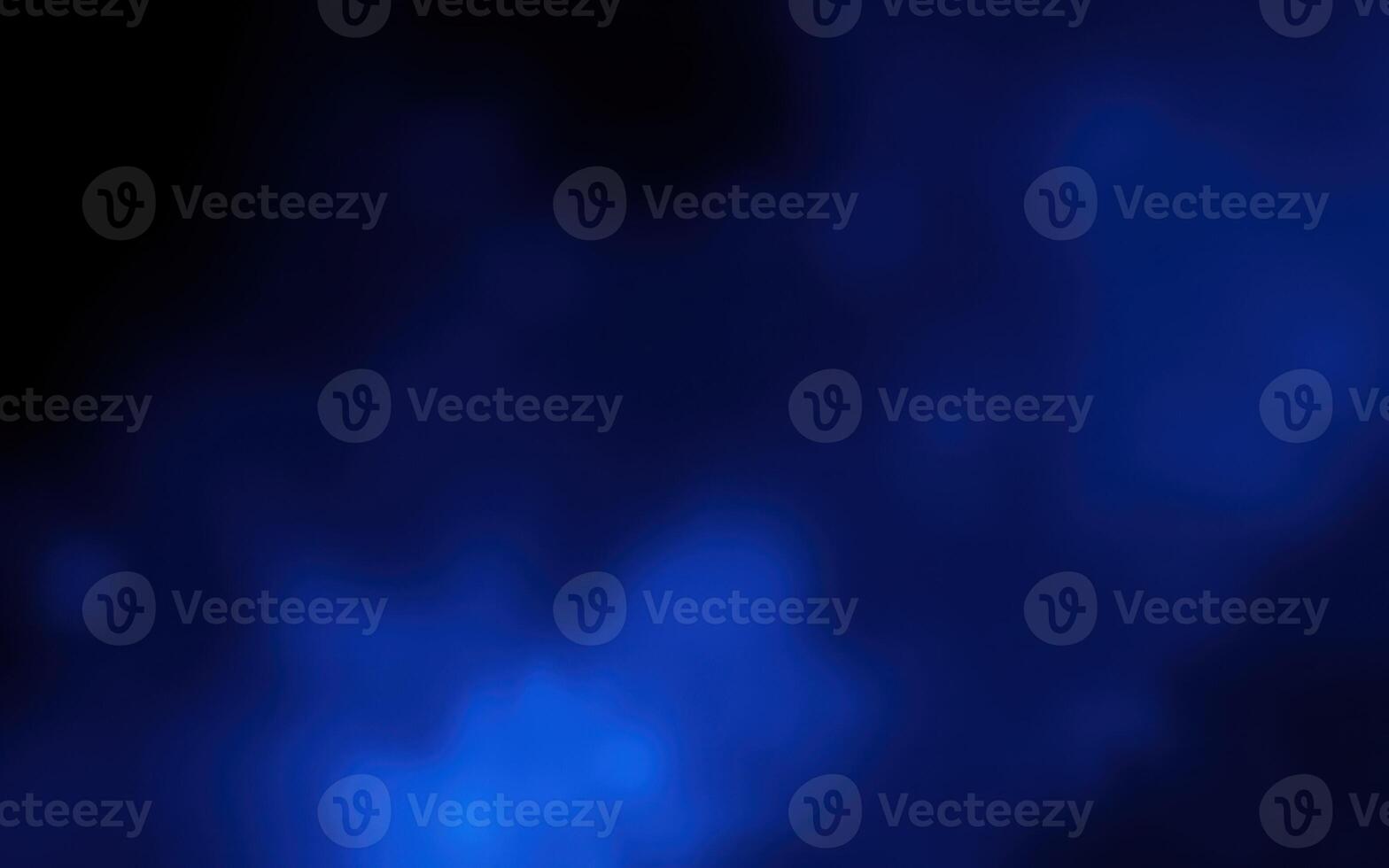 Abstract blue background with soft light patterns creating a serene atmosphere for various design uses photo