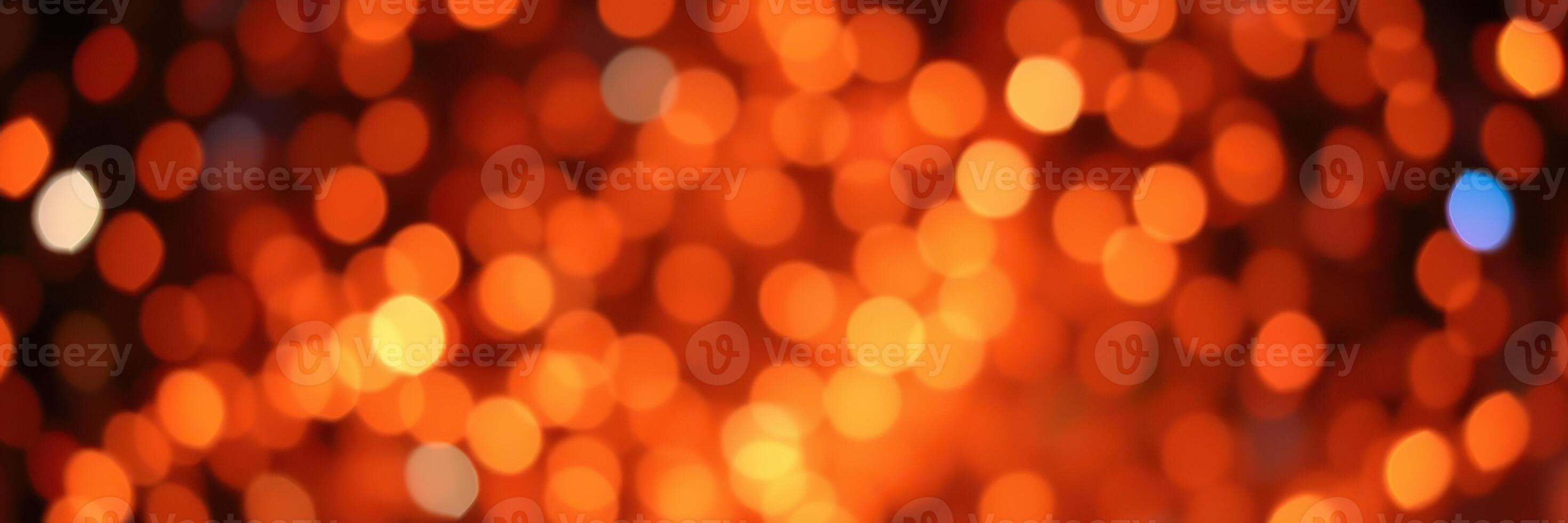 Bright orange bokeh lights create an enchanting atmosphere for a celebration or event photo