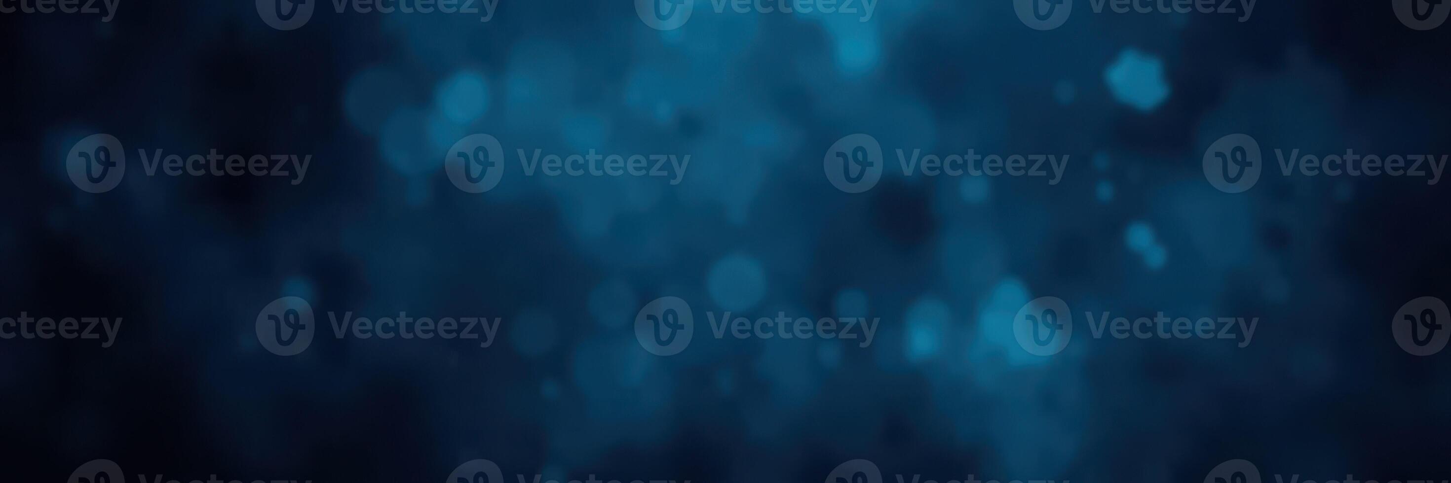 Vibrant blue bokeh background creates a calming atmosphere with sparkling light reflections and a modern, abstract aesthetic photo
