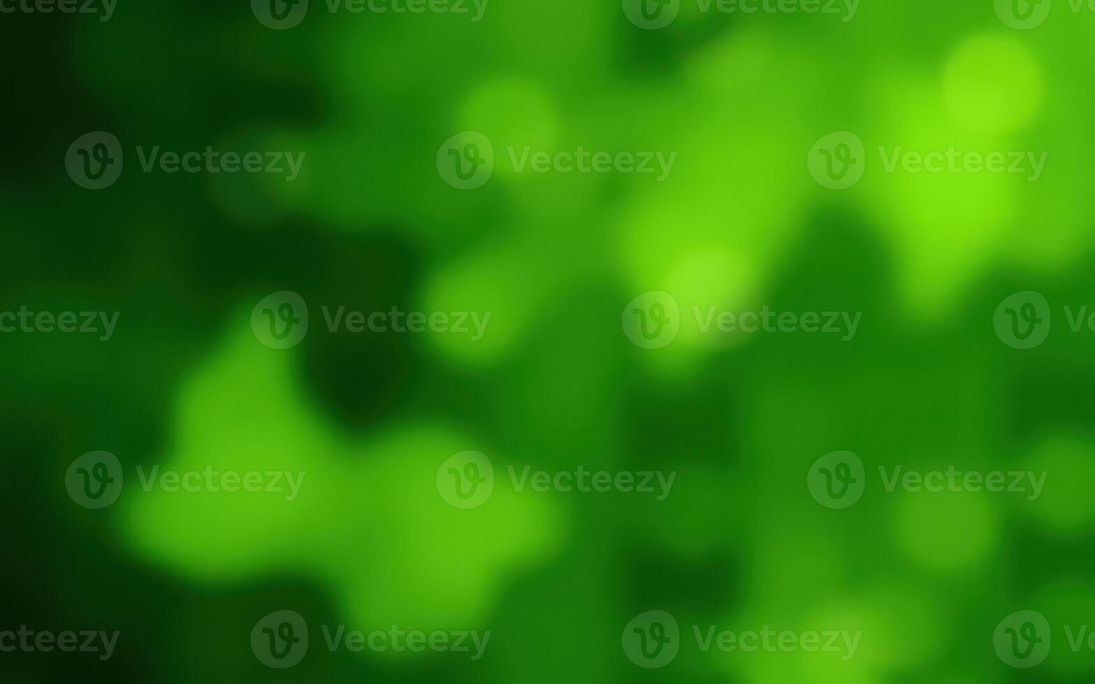 Soft green bokeh background creates a serene and calming atmosphere in an outdoor setting photo