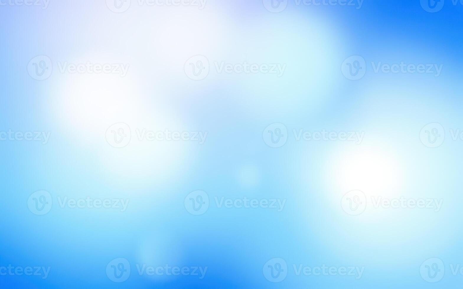 Soft blue sky with fluffy clouds creating a serene atmosphere during daylight photo