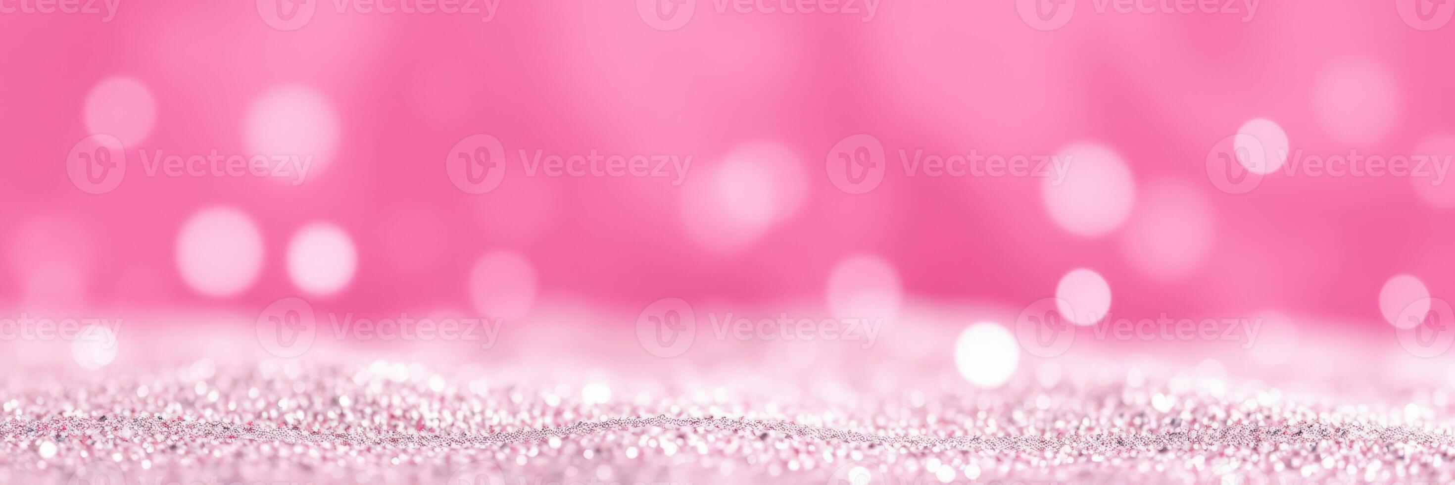Shimmering pink glitter background with soft bokeh effect creating a dreamy atmosphere photo