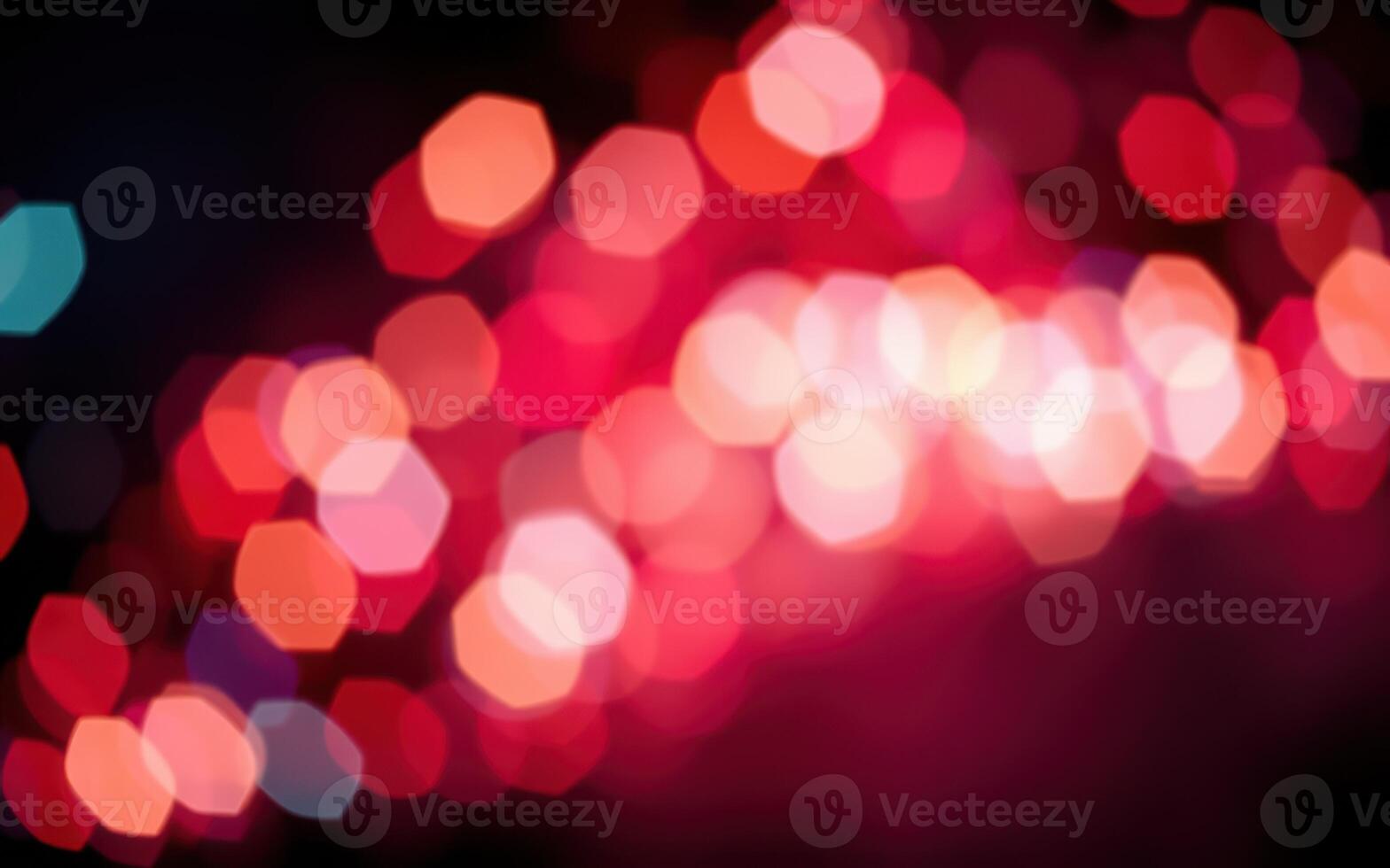 Bright and colorful bokeh lights create a vibrant visual display in a festive atmosphere at night outdoors photo