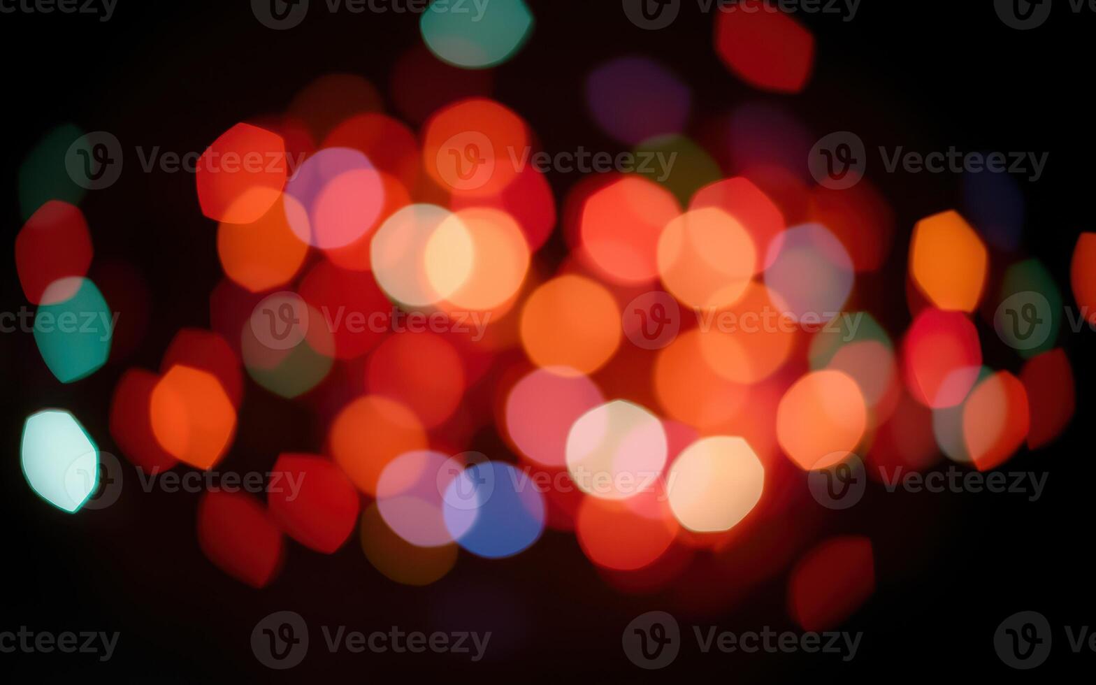 Colorful bokeh lights create a vibrant atmosphere during a festive celebration at night photo