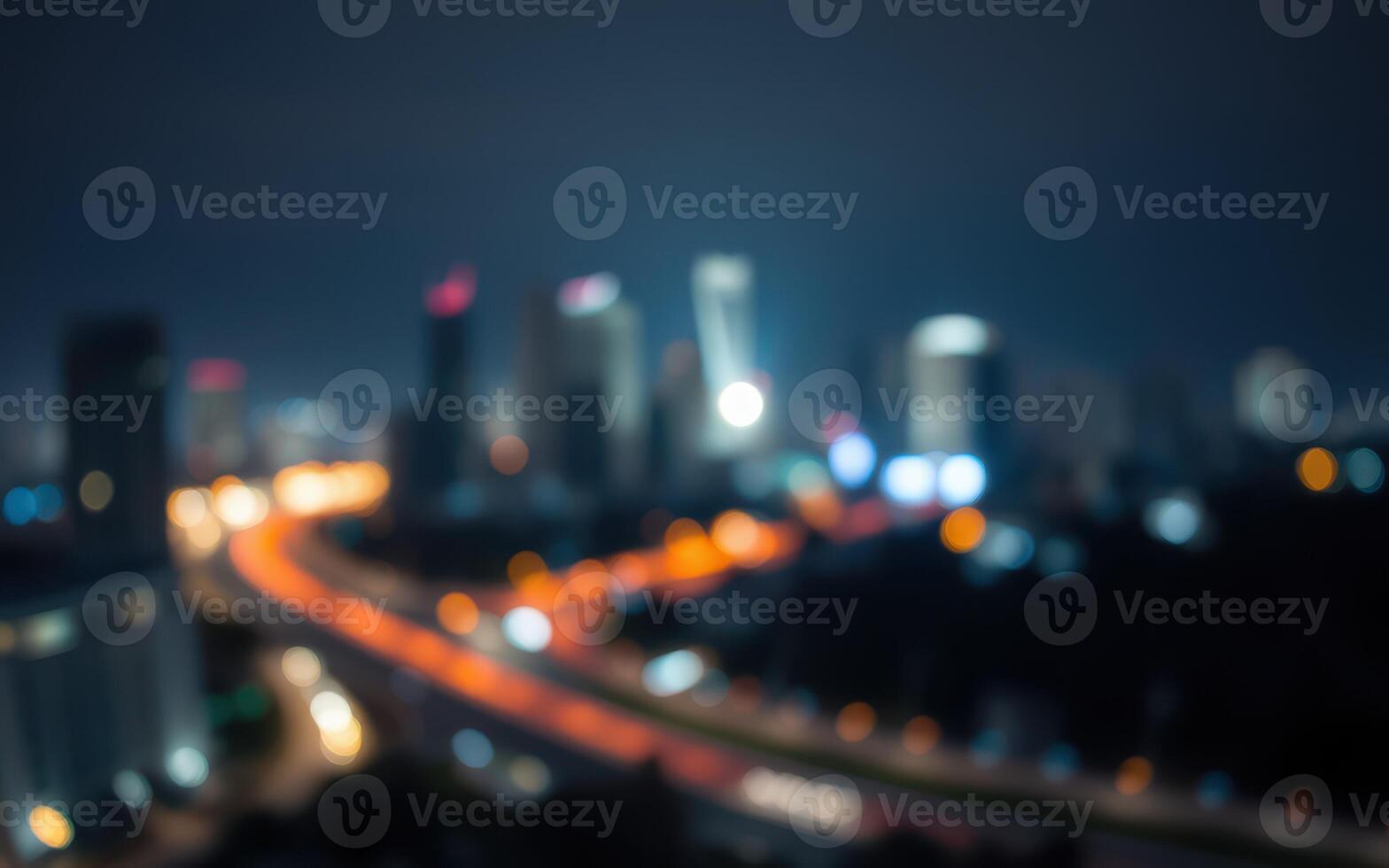 Nighttime city skyline with blurred lights and traffic capturing urban energy photo