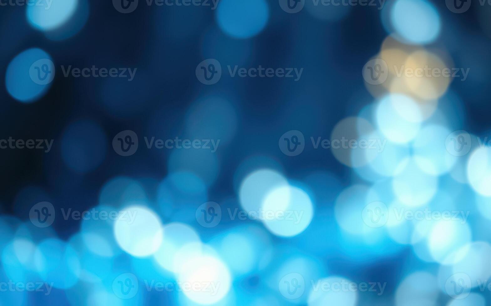 Beautiful bokeh effect creates a serene atmosphere with brilliant blue lights at night photo