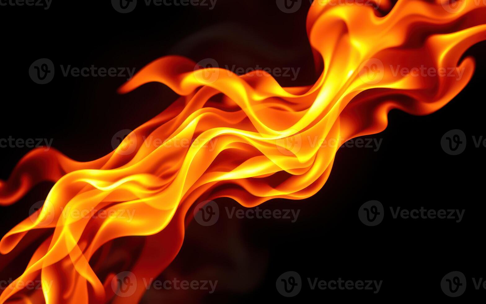 Flames dance gracefully against a dark background showcasing vibrant colors and fluid movement photo