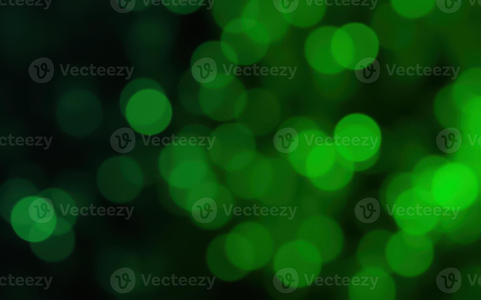 Vibrant green bokeh background creates a lively atmosphere for various projects and designs photo