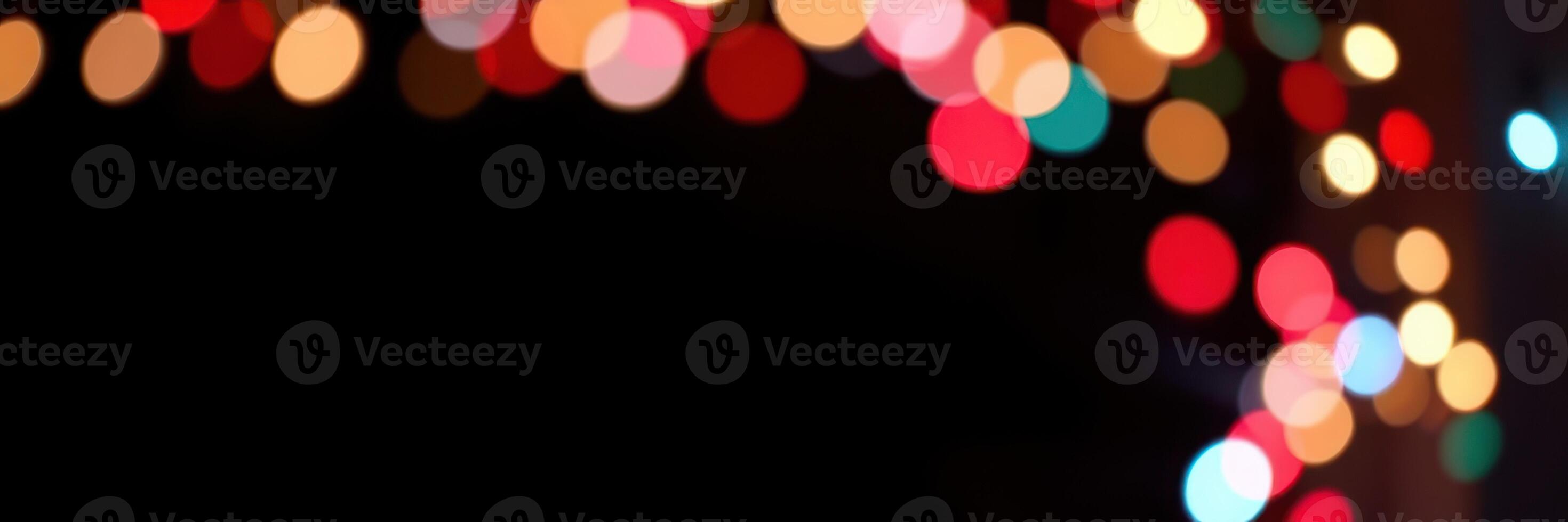 Colorful string lights create a festive atmosphere during a holiday celebration at night in a cozy setting photo