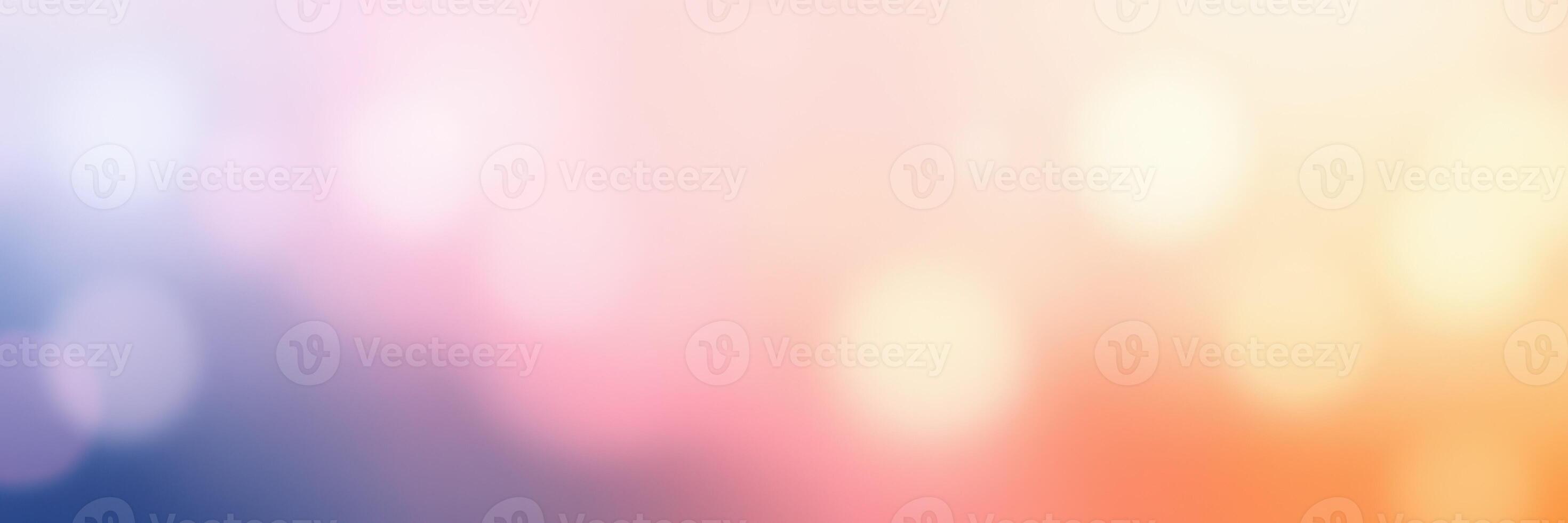 Soft gradient background featuring warm colors and blurred bokeh effects creating a serene atmosphere photo