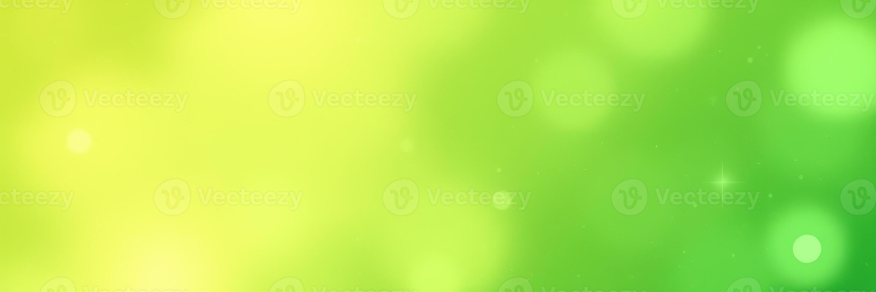 Colorful bokeh background with vibrant green and yellow hues creating a fresh spring atmosphere photo