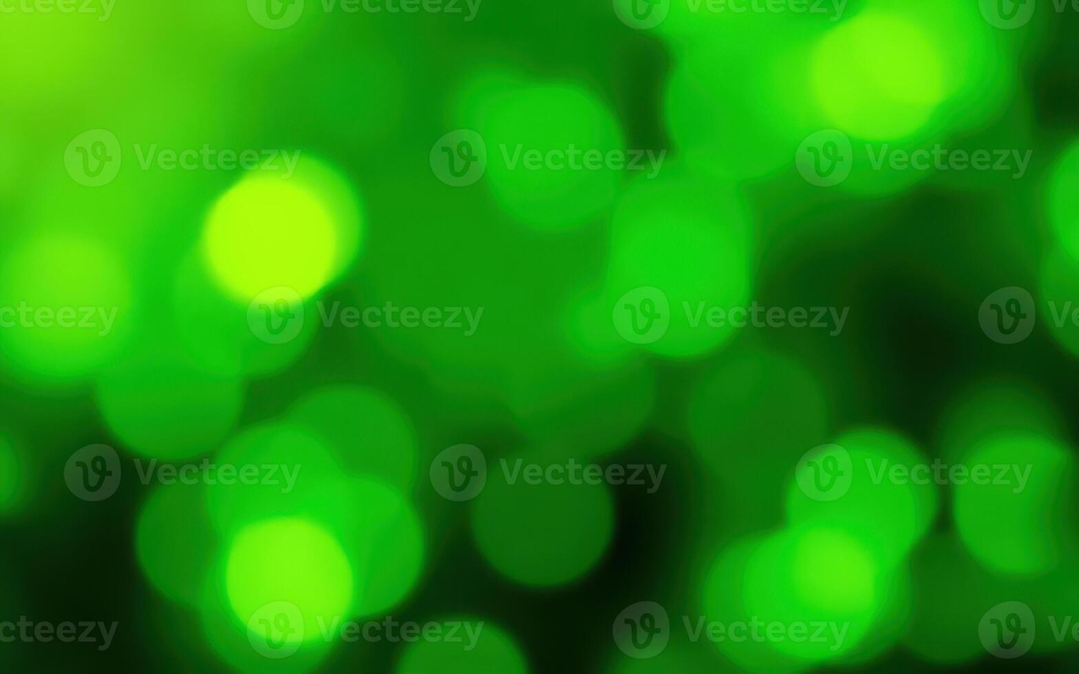 Vivid green bokeh background creates a lively and dynamic atmosphere for various designs and projects photo