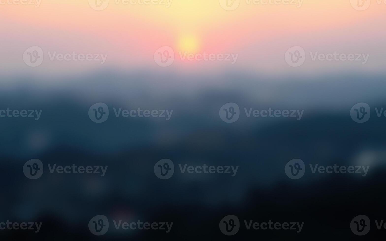 Sunset casts soft hues over distant hills, creating a tranquil atmosphere in the evening sky photo