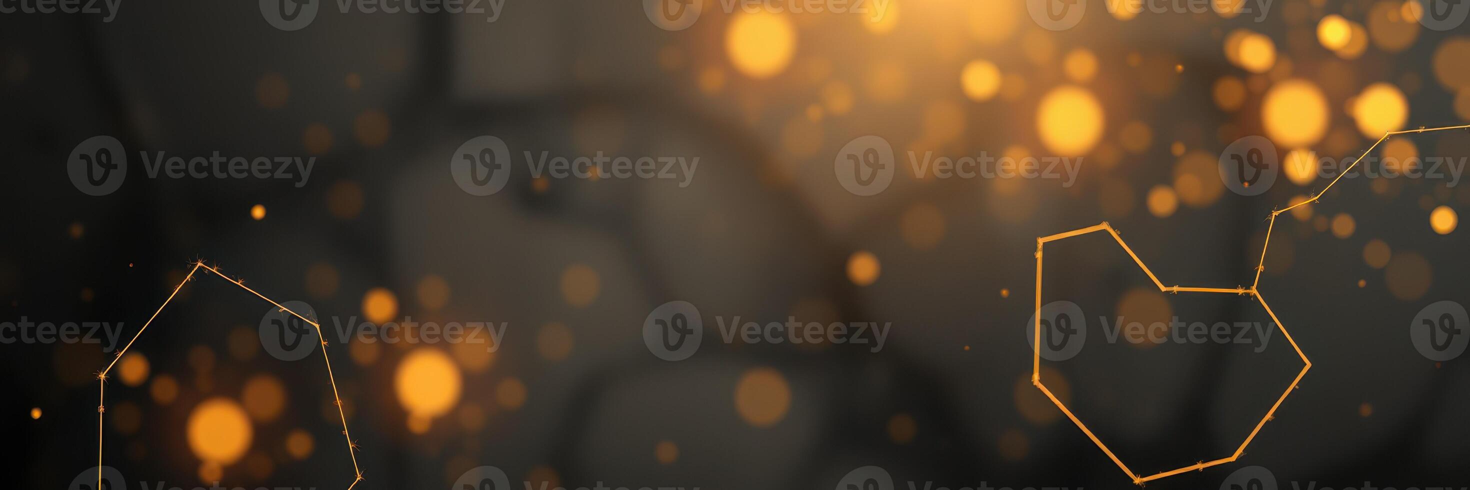Golden particles dance across a dark background creating a mesmerizing visual effect photo