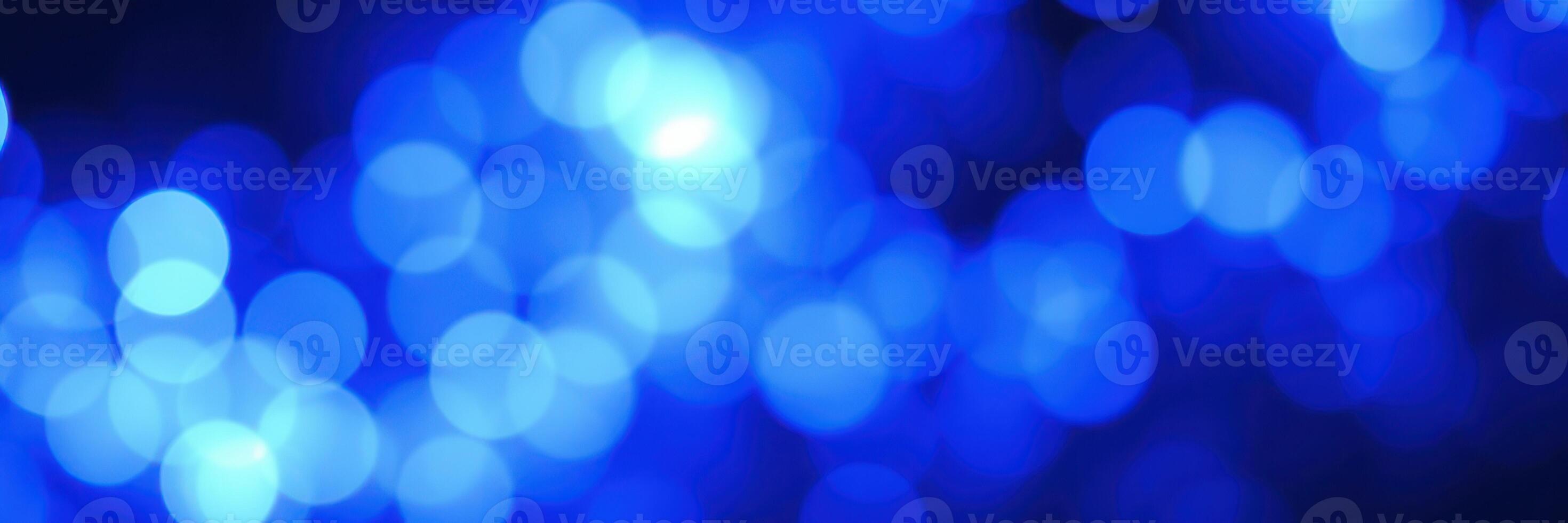 Colorful blue bokeh lights create a dreamy atmosphere for evening gatherings photo