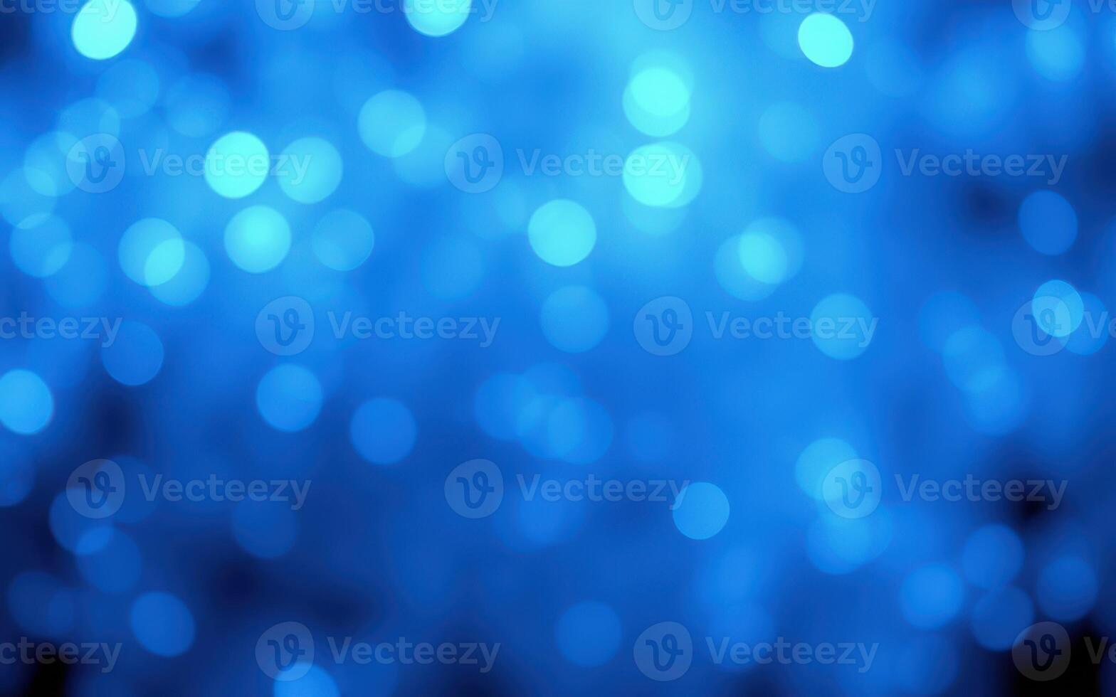 Vibrant blue bokeh lights create a mesmerizing backdrop for events or creative projects photo
