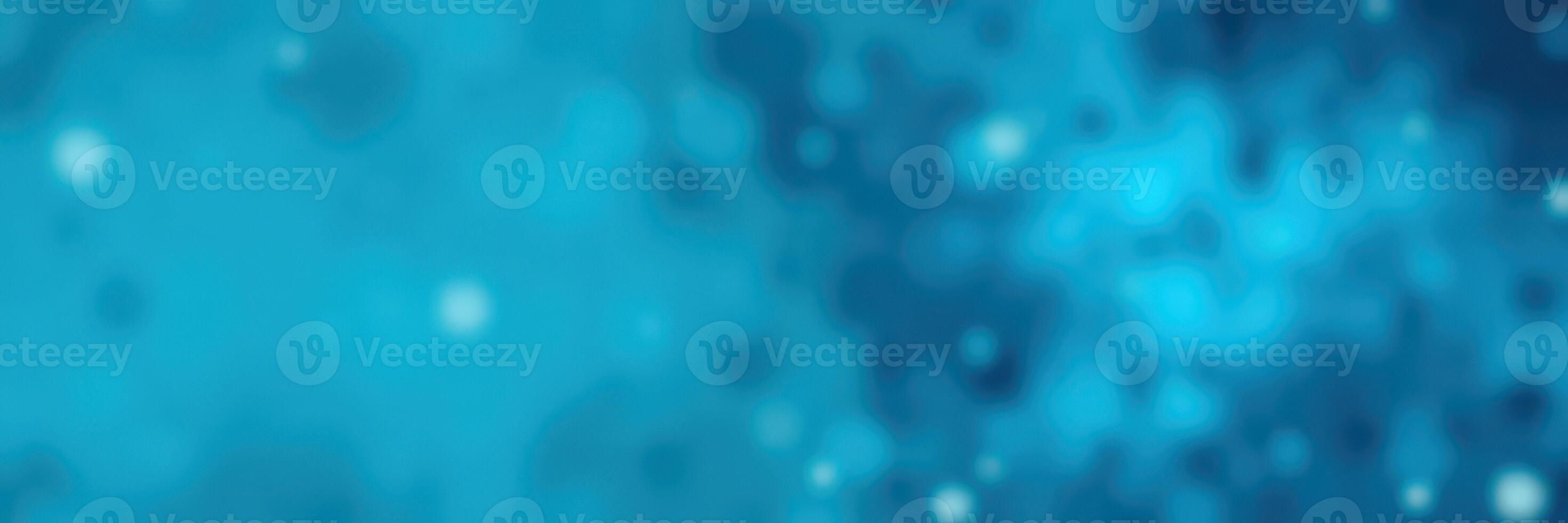 Vibrant blue bokeh background with shimmering lights creating a festive atmosphere for celebrations and events photo