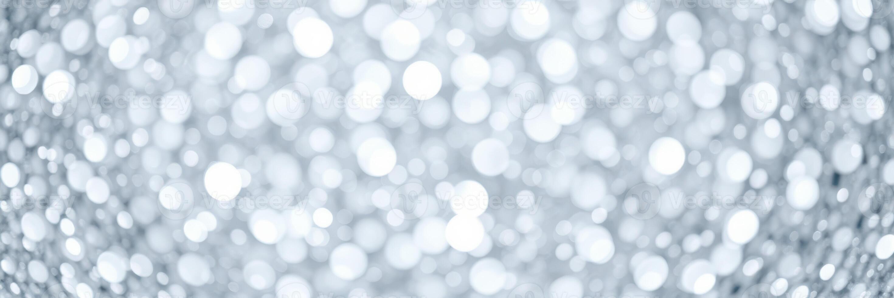 Sparkling light reflections create a dreamy atmosphere with shimmering bokeh effects at a festive gathering photo
