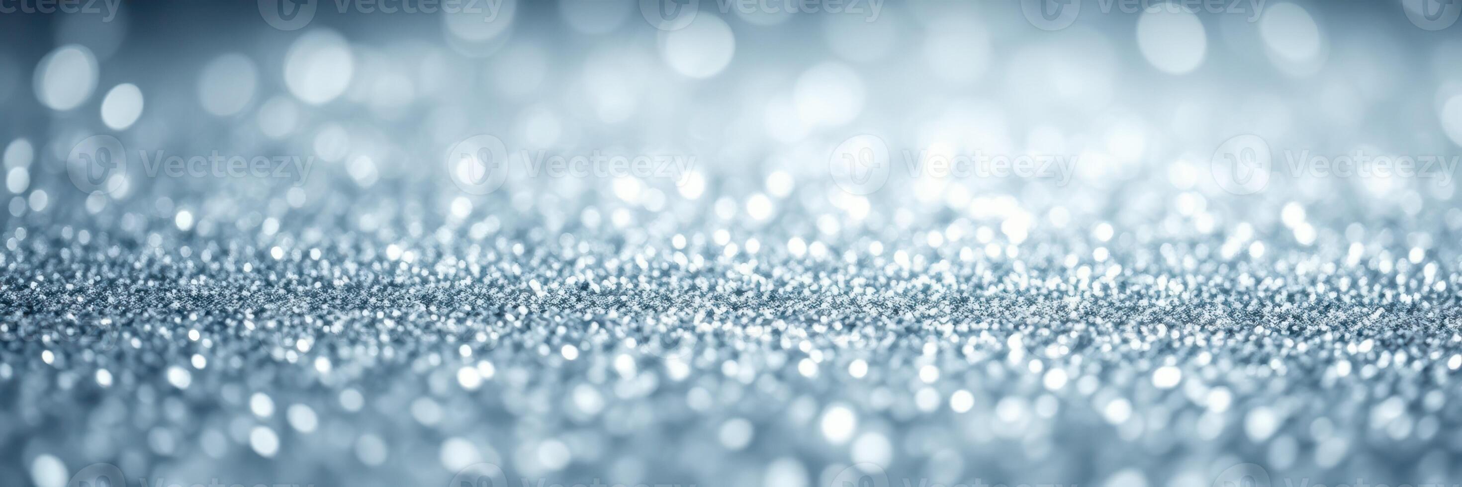 Shimmering blue and silver texture reflecting light in a soft, abstract display photo