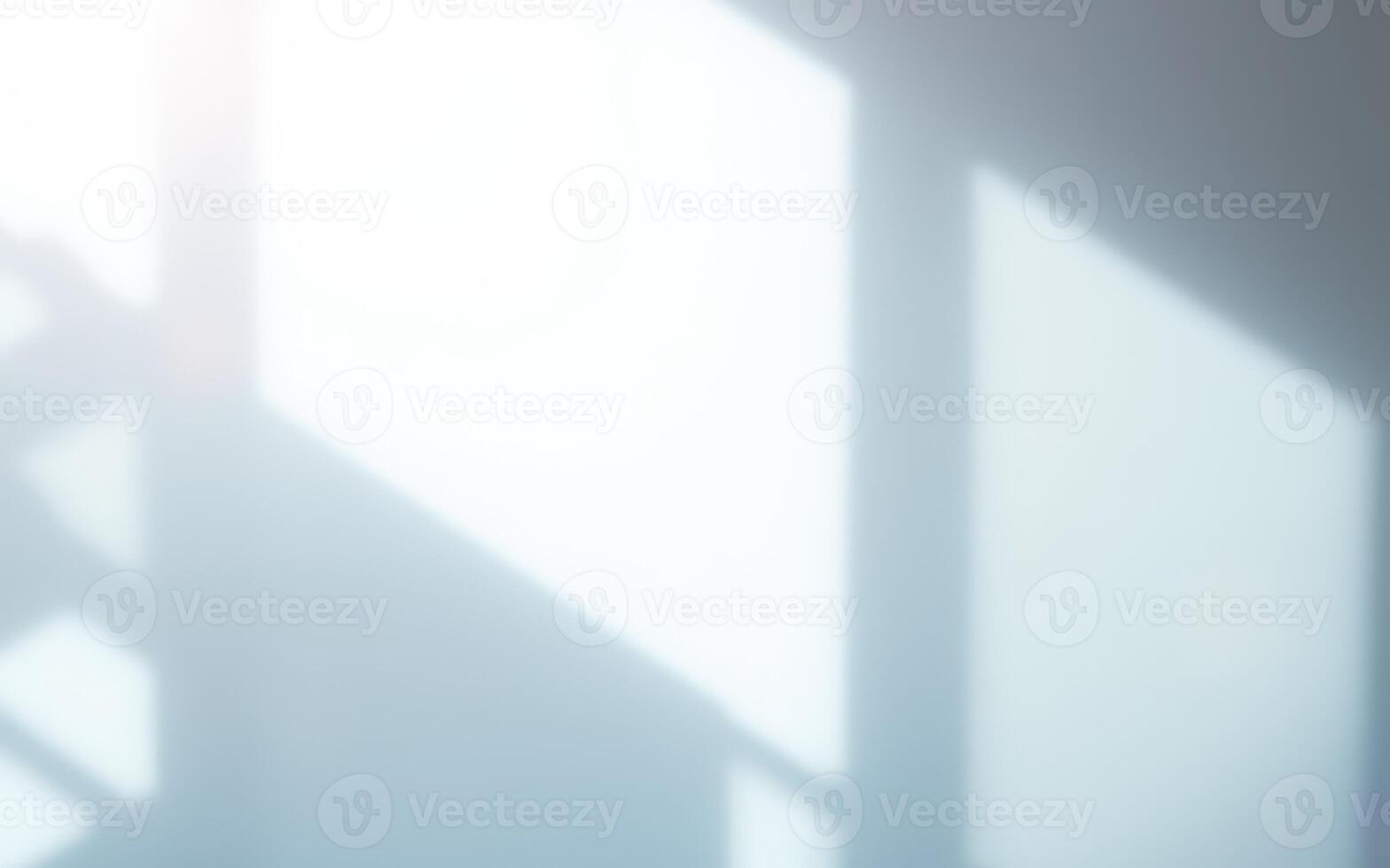 Soft sunlight streaming through a window creates delicate shadows on a wall in a tranquil indoor space photo