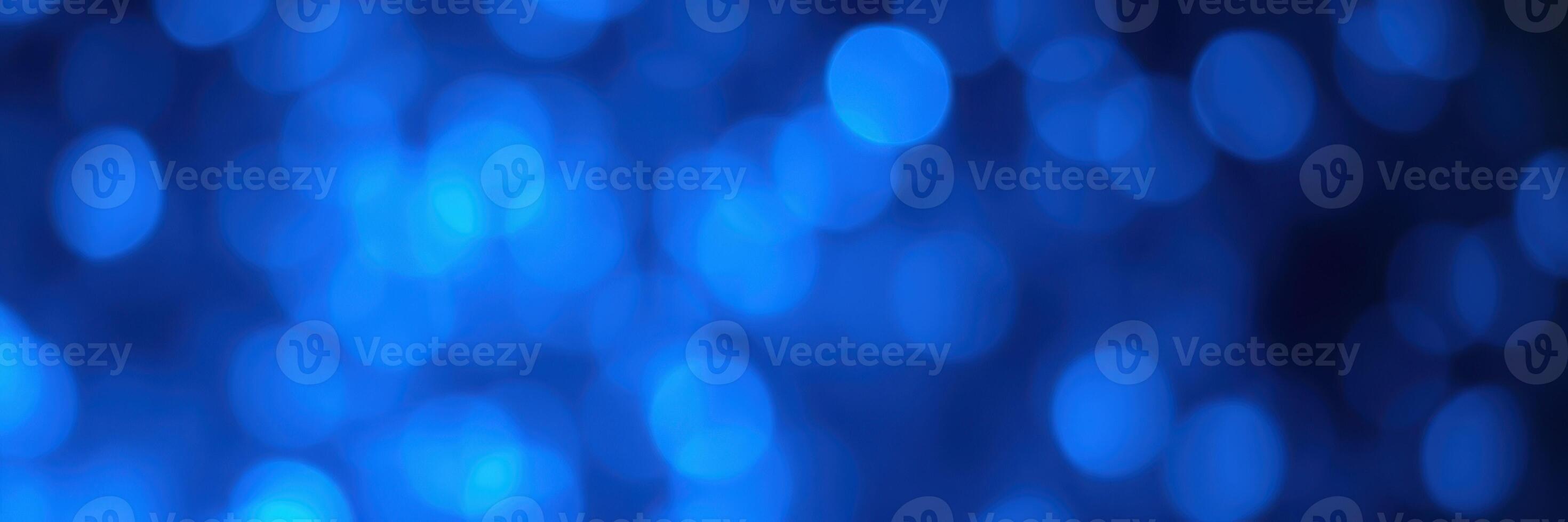 Abstract blue bokeh background rendering a vibrant and soothing atmosphere perfect for design projects photo