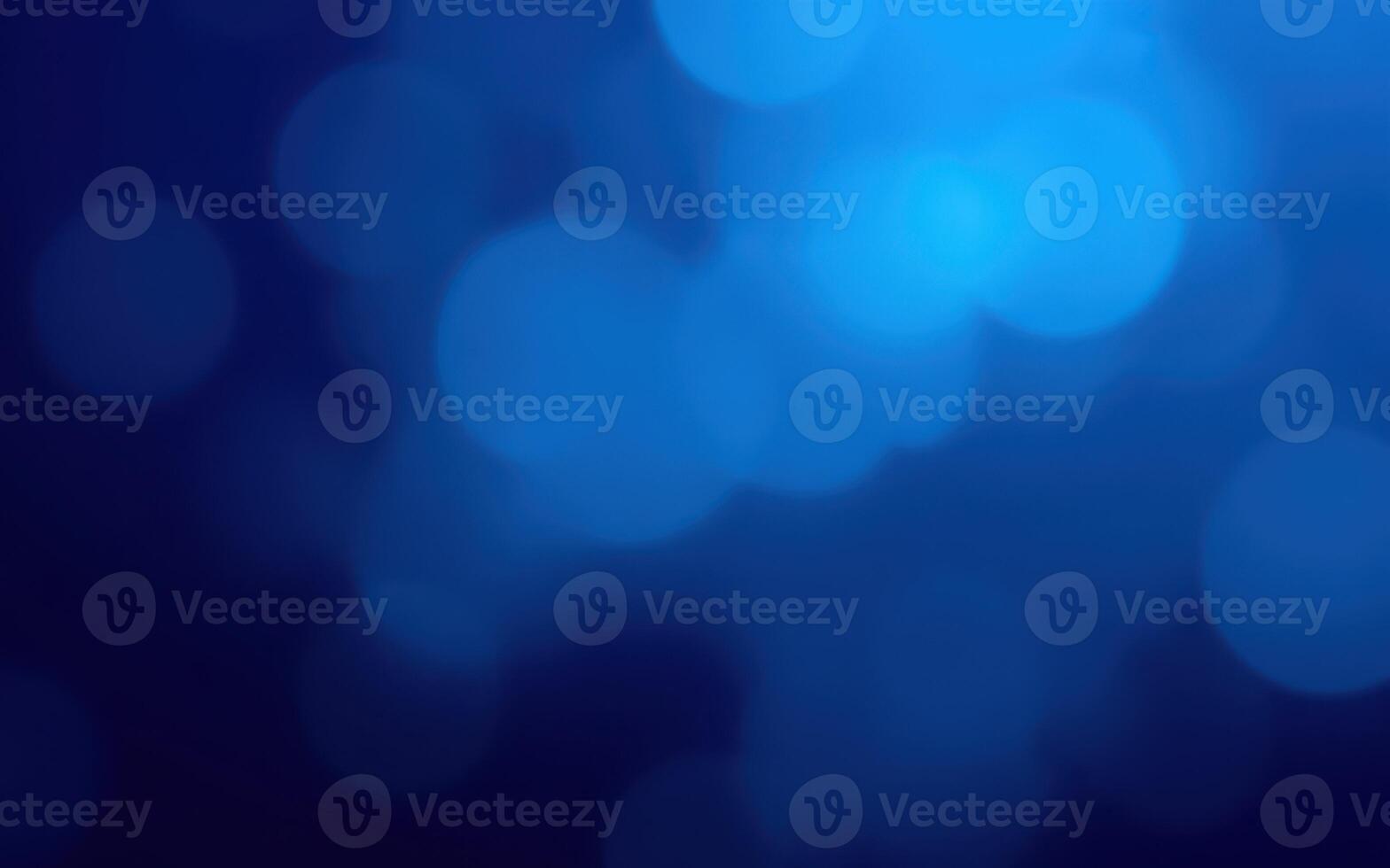 Colorful blue bokeh lights create an enchanting atmosphere for an evening gathering photo