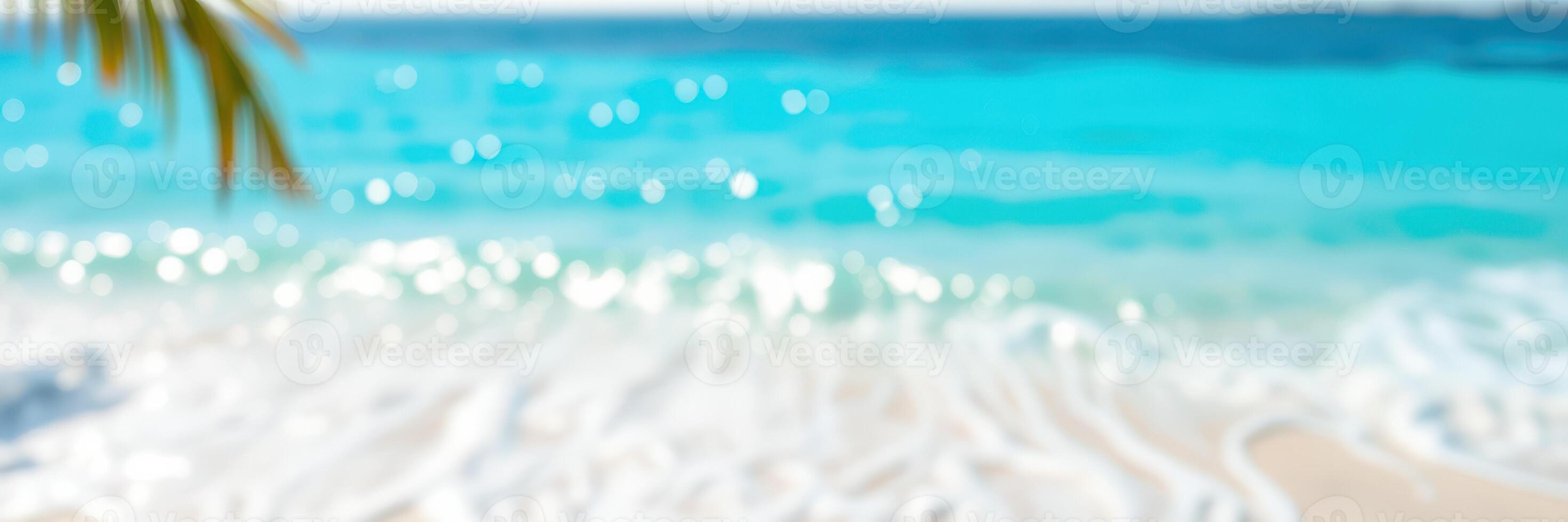 Relaxing beach with turquoise waters and gentle waves during sunny weather in tropical paradise location photo