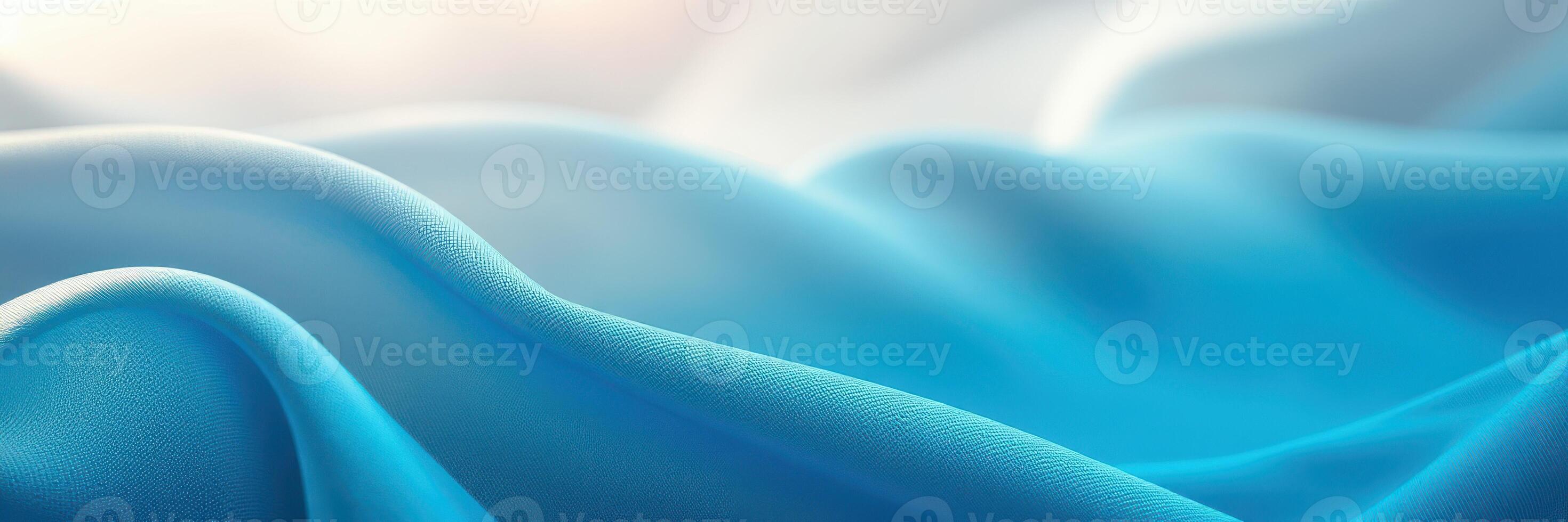 Soft blue fabric undulating gently, creating a serene and calming atmosphere photo