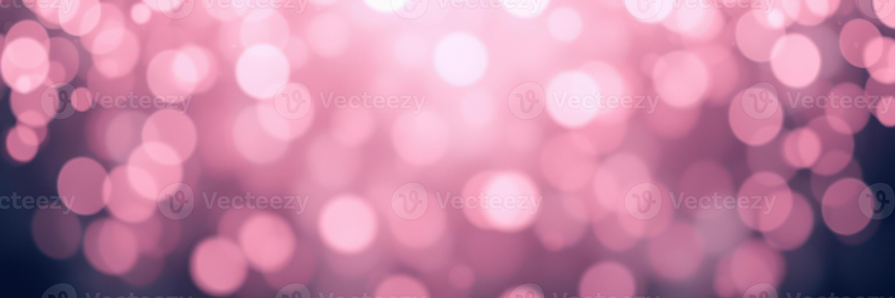 Soft pink bokeh lights create a dreamy atmosphere in an evening event photo