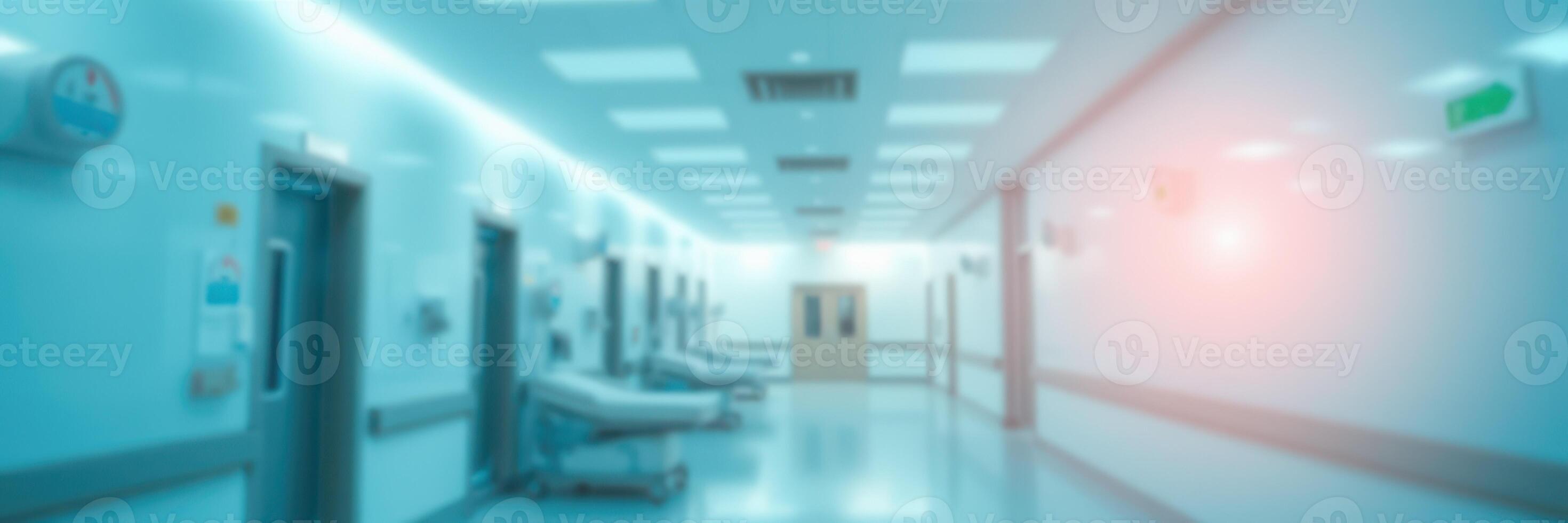 Brightly lit hospital corridor with empty patient rooms showcasing a clean and modern healthcare environment photo