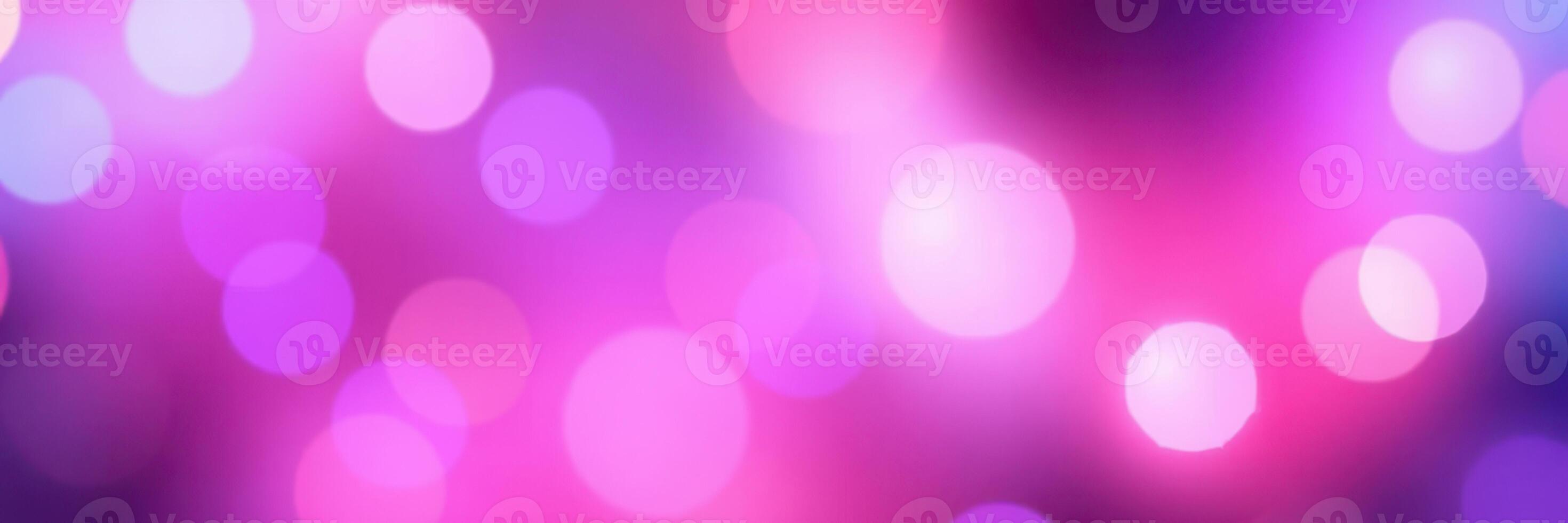 Colorful abstract background with vibrant bokeh lights in shades of pink and purple for artistic designs and moods photo