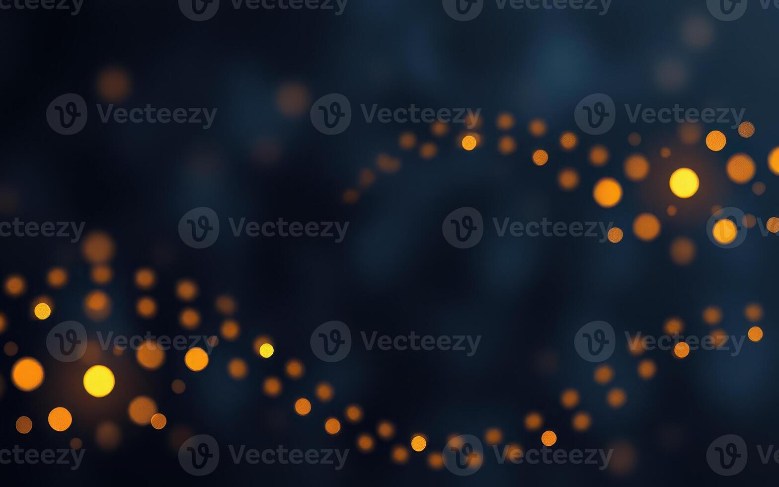 Swirling golden lights create a mesmerizing pattern in a dark background during a festive celebration photo