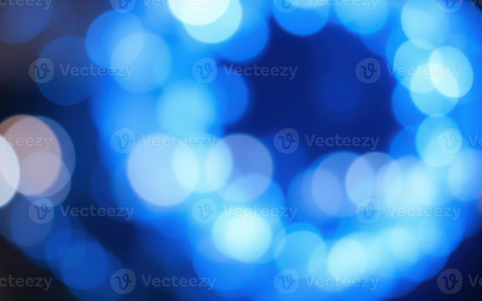 Colorful blue bokeh lights create an enchanting atmosphere during evening festivities photo