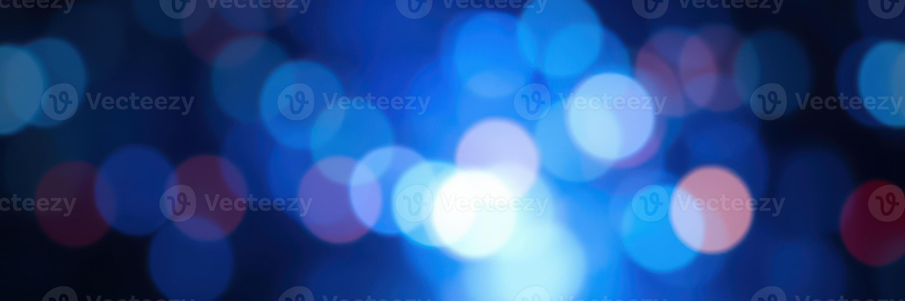 Colorful bokeh lights create a mesmerizing atmosphere in a nighttime urban environment photo