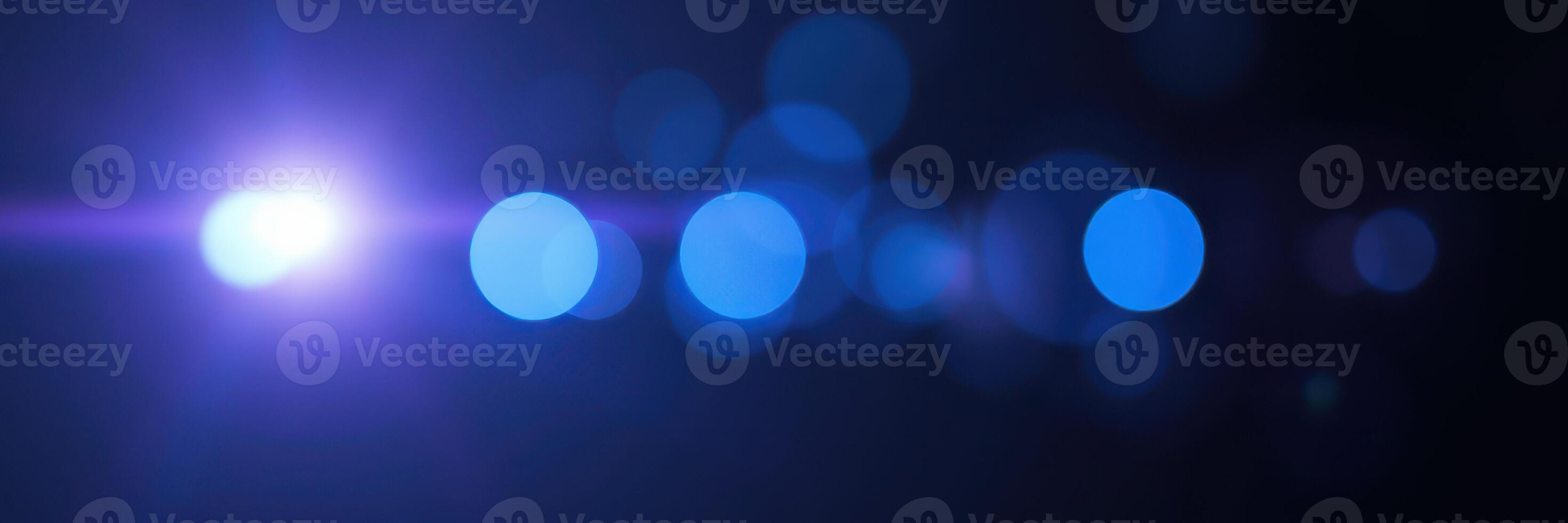 Colorful bokeh lights create a mesmerizing background effect in an artistic display during a nighttime event photo