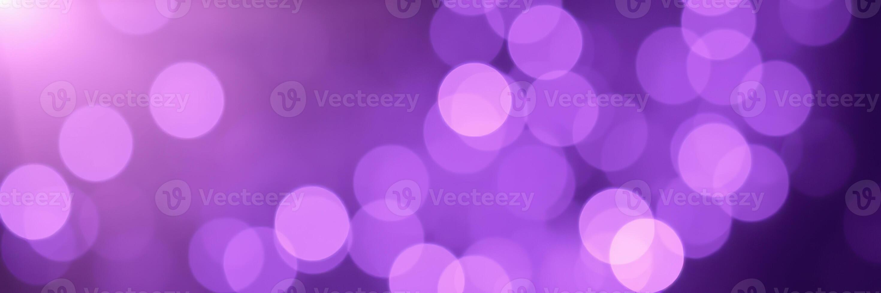Colorful bokeh lights create a dreamy atmosphere in a purple-themed backdrop for a festive gathering photo