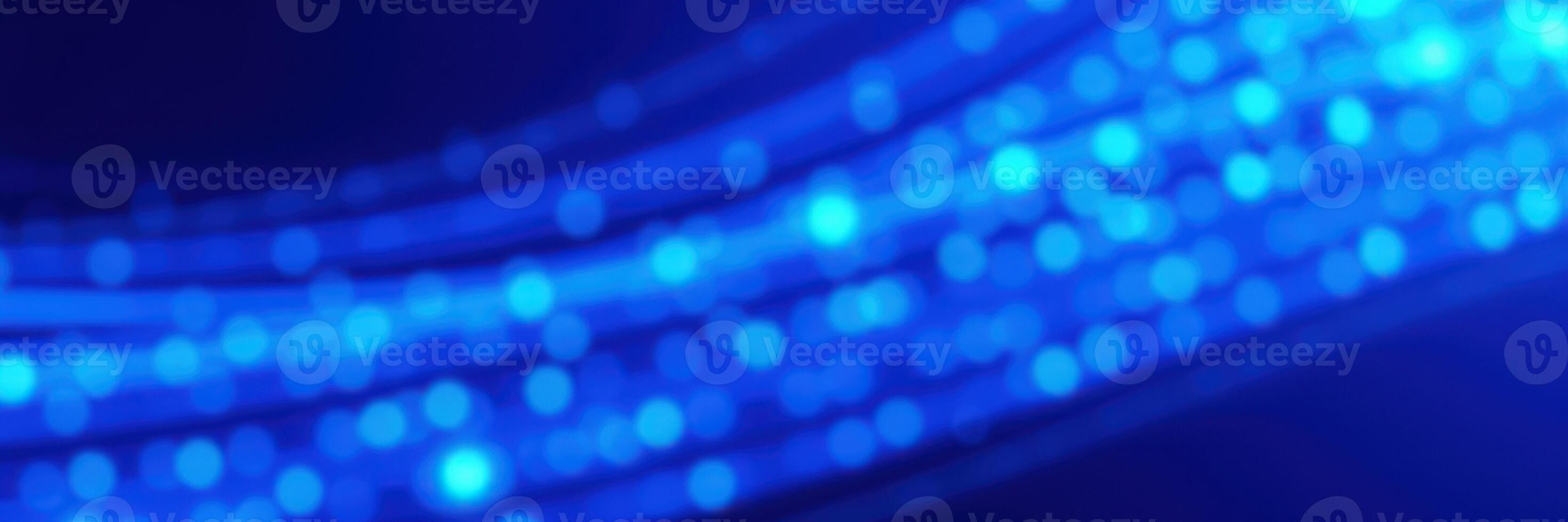 Vibrant blue abstract background with glowing dots and flowing patterns creating a calming atmosphere photo