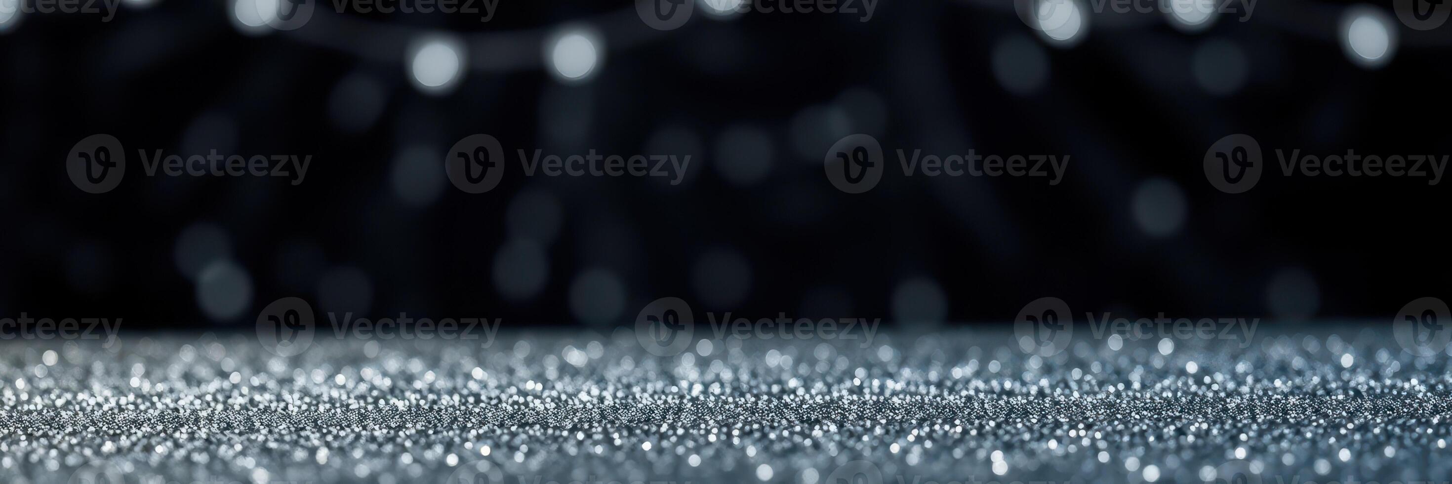 Sparkling surface with blurred lights in the background creating a festive atmosphere photo