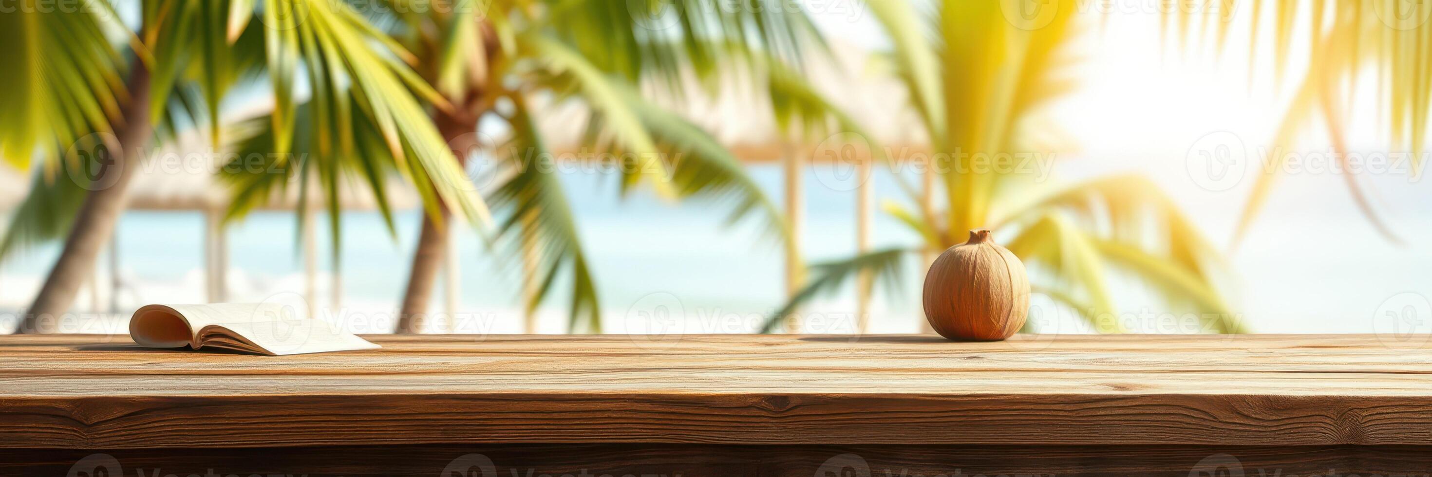 Relaxing tropical setting with a coconut and a book near the beach at sunset photo