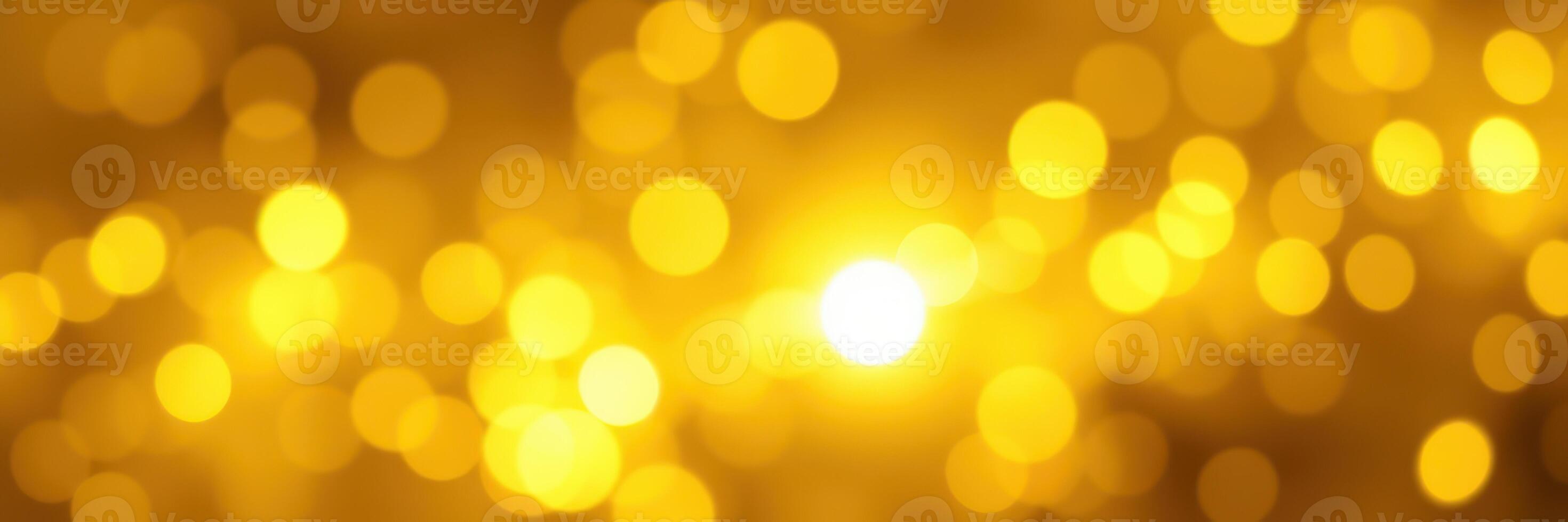 Bright golden bokeh lights create a warm and inviting atmosphere during a festive celebration photo