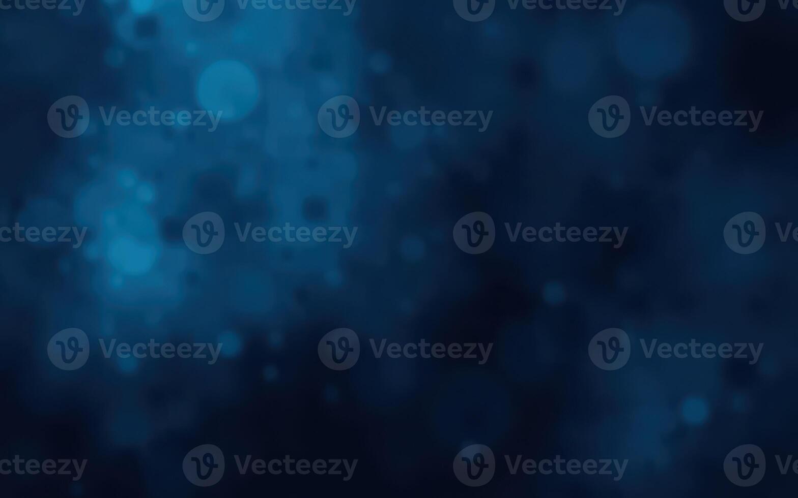 Swirling blue abstract background with soft glowing particles and bokeh effects in a digital design photo