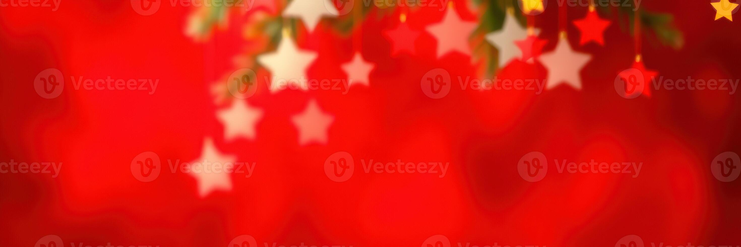 Festive decoration with colorful stars hanging against a vibrant red background during a holiday celebration photo