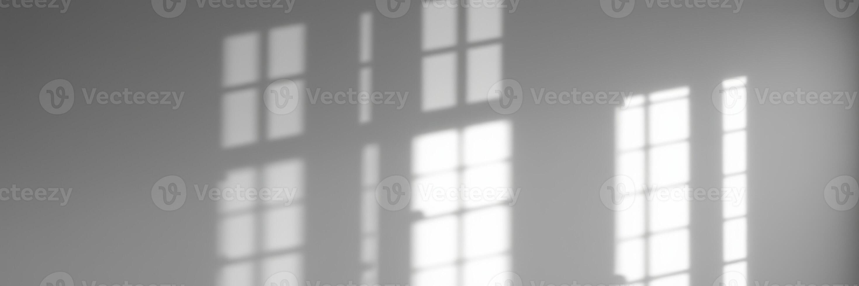 Soft shadows cast by sunlight filtering through windows in a calm indoor space during morning hours photo