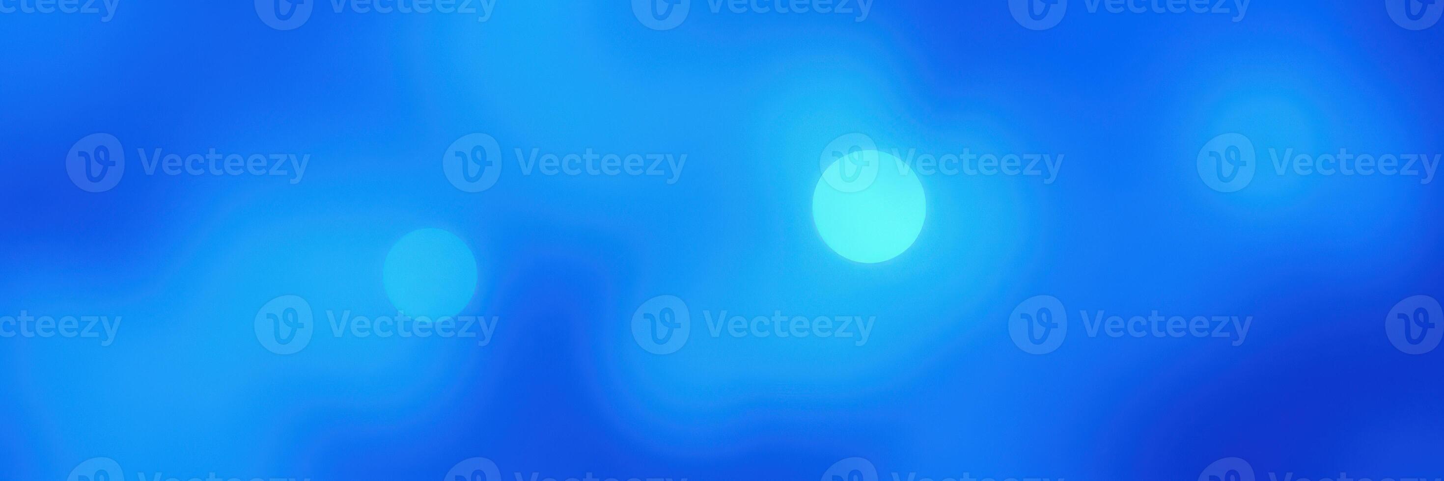 Vibrant blue abstract background with glowing circular lights creating a serene atmosphere at dusk photo