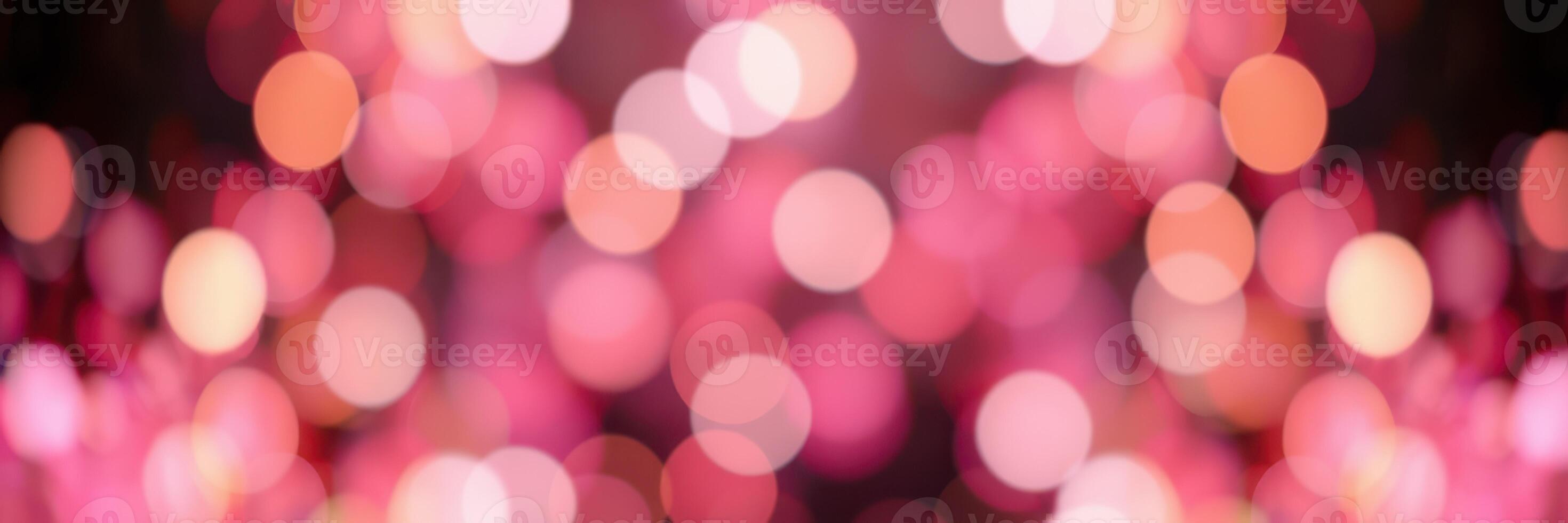 Bright pink bokeh lights create a festive atmosphere perfect for celebrations and artistic backgrounds photo